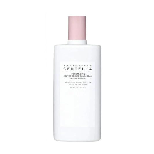 White bottle with pink cap labeled 'Madagascar Centella' on a white background
